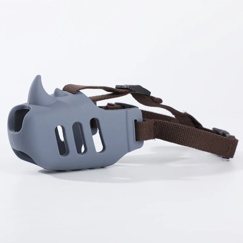 the RHINOSHIELD PET MUZZLE - Pet Dog Muzzle, Silicone Pet Muzzle, Anti-Biting, Barking, and Eating, Rhinoceros-Shaped Medium and Large Dog Muzzle
