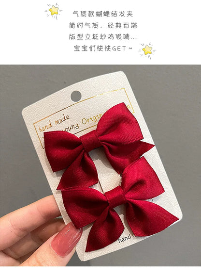 the BEAUTY BOWS - 2PCS Solid Dog Bows, Dog Hair Clips, Pet Bowknot, Doggy Hair Grooming Products for Puppy/Kitten/Dog, Hair Barrette Pet Accessories