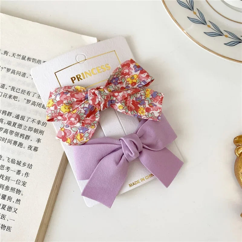 the BEAUTY BOWS - 2PCS Solid Dog Bows, Dog Hair Clips, Pet Bowknot, Doggy Hair Grooming Products for Puppy/Kitten/Dog, Hair Barrette Pet Accessories