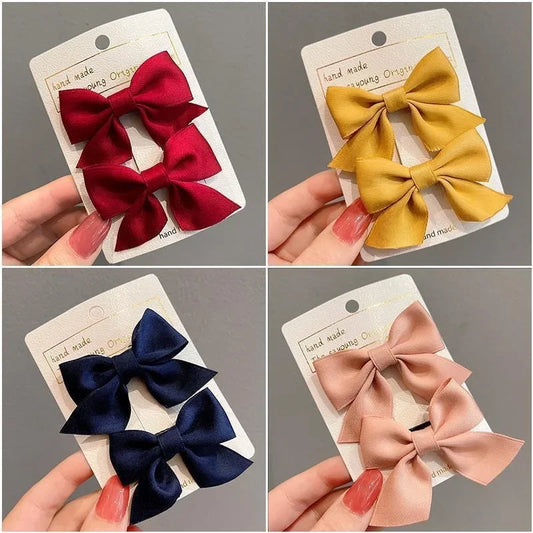the BEAUTY BOWS - 2PCS Solid Dog Bows, Dog Hair Clips, Pet Bowknot, Doggy Hair Grooming Products for Puppy/Kitten/Dog, Hair Barrette Pet Accessories
