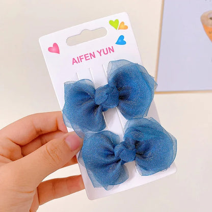 the BEAUTY BOWS - 2PCS Solid Dog Bows, Dog Hair Clips, Pet Bowknot, Doggy Hair Grooming Products for Puppy/Kitten/Dog, Hair Barrette Pet Accessories