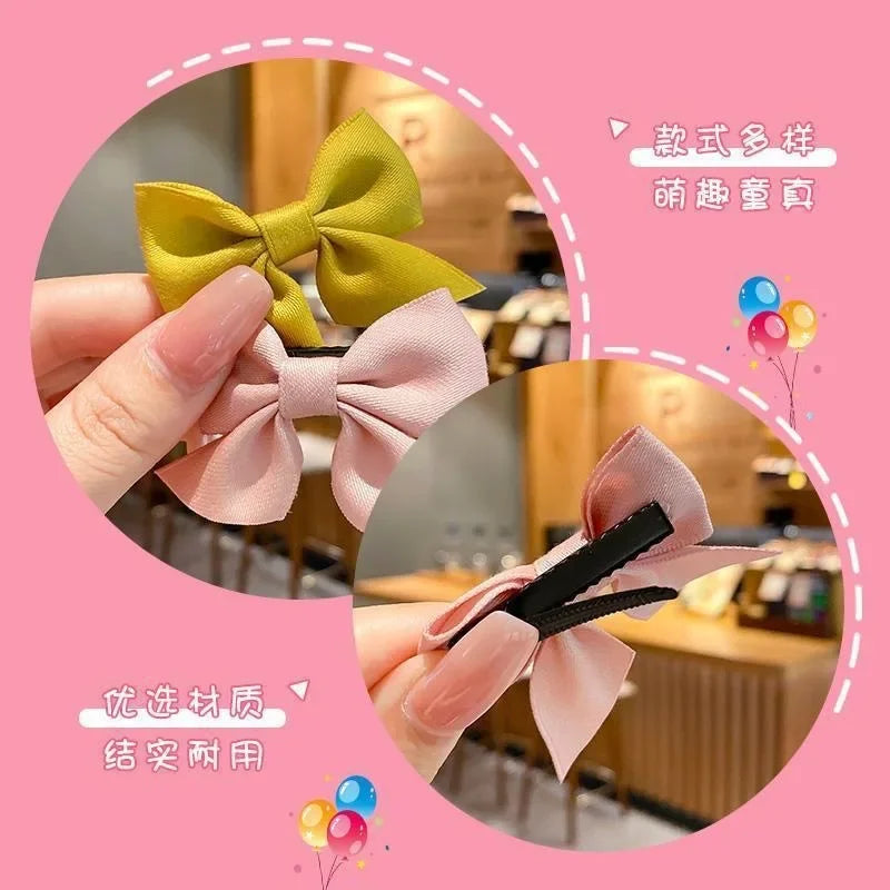 the BEAUTY BOWS - 2PCS Solid Dog Bows, Dog Hair Clips, Pet Bowknot, Doggy Hair Grooming Products for Puppy/Kitten/Dog, Hair Barrette Pet Accessories