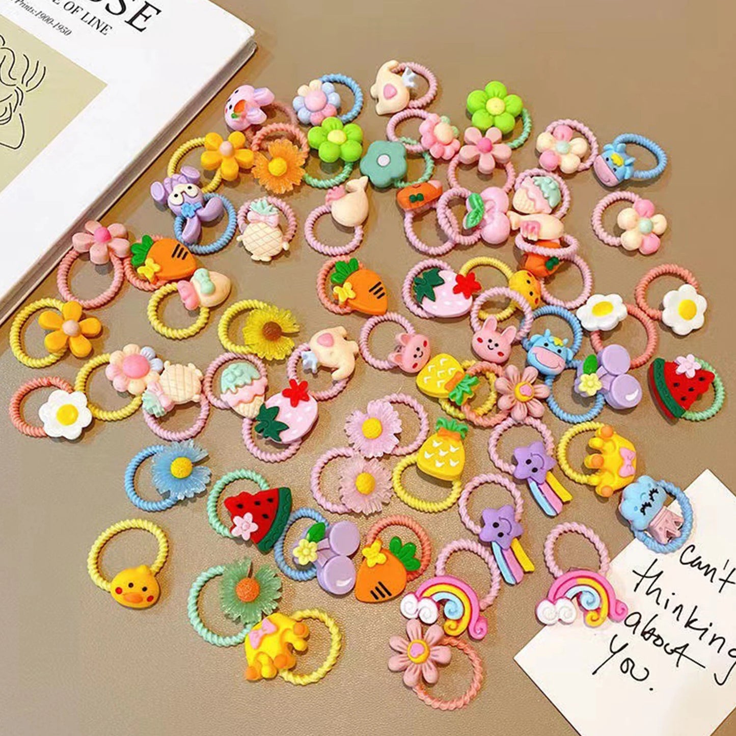 the DAISY DOG BOW - 40PCS Hair Bows, Fashion Cute Small Dog/Cat Hair Bows, Dogs/Cats Hair Accessories, Rubber Bands Bows for Dogs Grooming Products