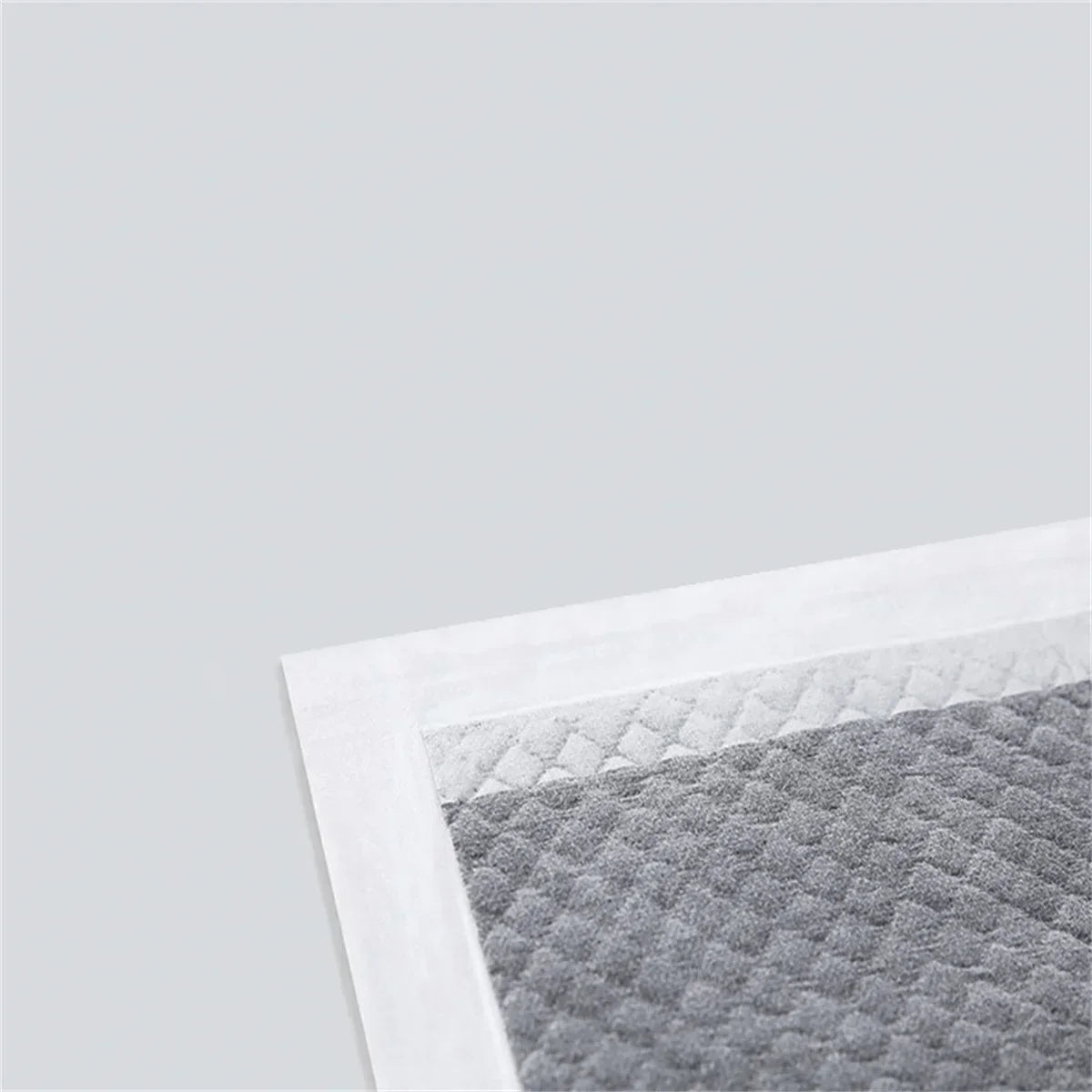 the BAMBOO PUPPY PADS - Eco-Friendly Bamboo Charcoal Puppy Pads- 20/40/50/100PCS Quick-Dry Absorbent Disposable Dog Diapers for Training & Clean Comfort