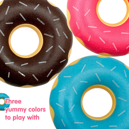 Rubber donut dog toy with functions of grinding teeth, cleaning teeth, interactive companionship, relaxation, and vocalization