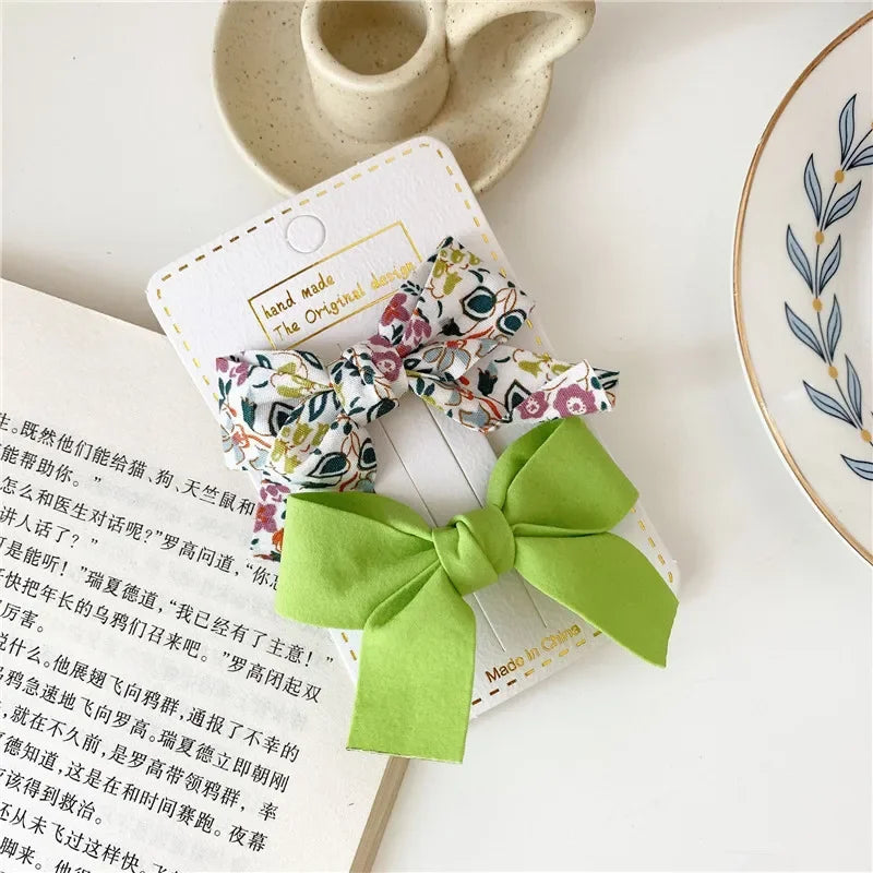 the BEAUTY BOWS - 2PCS Solid Dog Bows, Dog Hair Clips, Pet Bowknot, Doggy Hair Grooming Products for Puppy/Kitten/Dog, Hair Barrette Pet Accessories