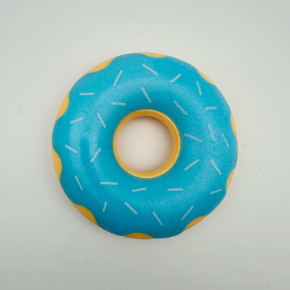 Rubber donut dog toy with functions of grinding teeth, cleaning teeth, interactive companionship, relaxation, and vocalization