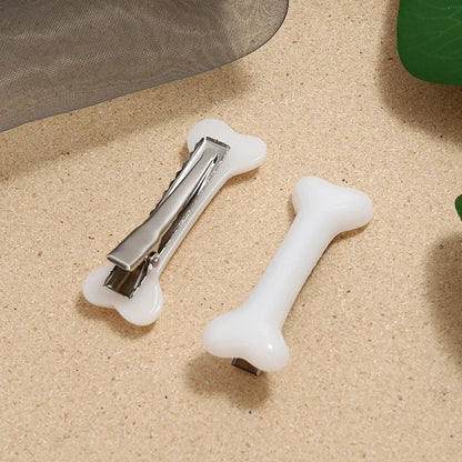 the PAWCHARM BONE HAIR CLIP - New Dog Hairpin Puppy/Kitten Bone Hair Clips, Cute Duckbill Clip, Pet Hair Accessories, Pet Hair Grooming, Dog Accessories