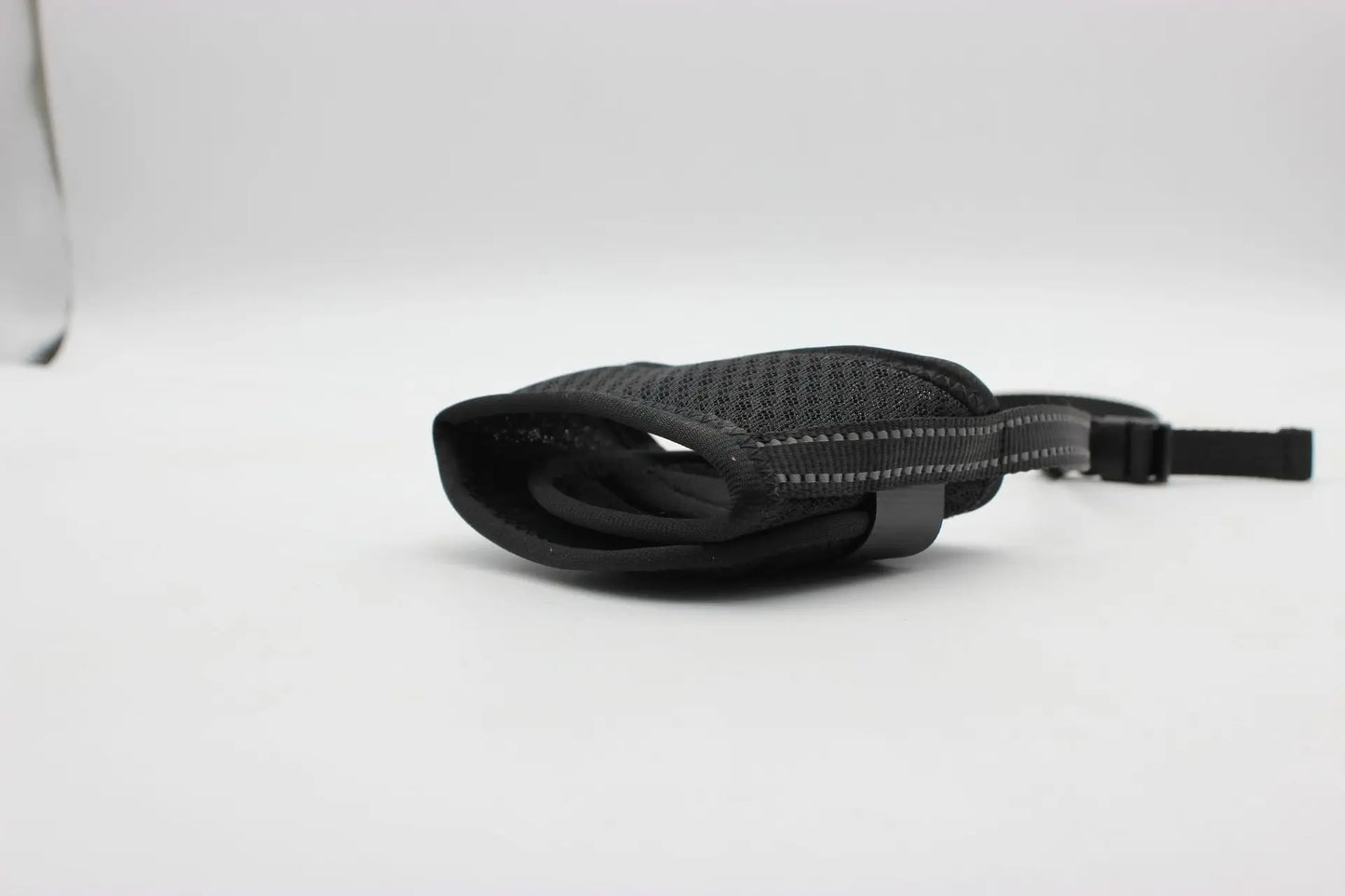 the ANTI-BITE DOG MUZZLE - Soft Air Mesh Dog Muzzle for Small, Medium & Large Dogs – Anti-Bite, Anti-Bark, Anti-Chew, Breathable, Drinkable & Adjustable