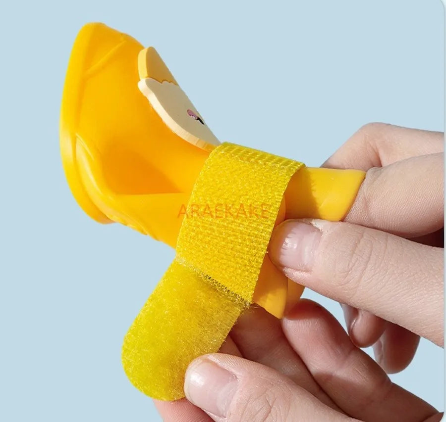 the RAIN BOOTS - Dogs Waterproof Cute Egg-Shaped Silicone Rain Shoes, Small and Medium-Sized Dogs, Rain Resistant, Anti-Slip Pet Shoes