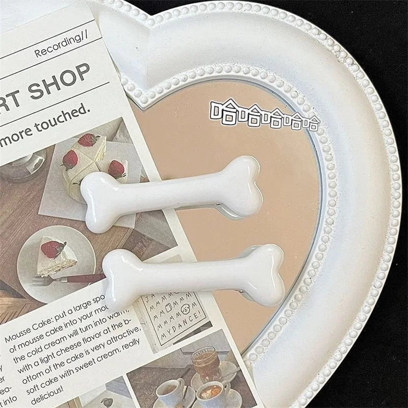 the PAWCHARM BONE HAIR CLIP - New Dog Hairpin Puppy/Kitten Bone Hair Clips, Cute Duckbill Clip, Pet Hair Accessories, Pet Hair Grooming, Dog Accessories