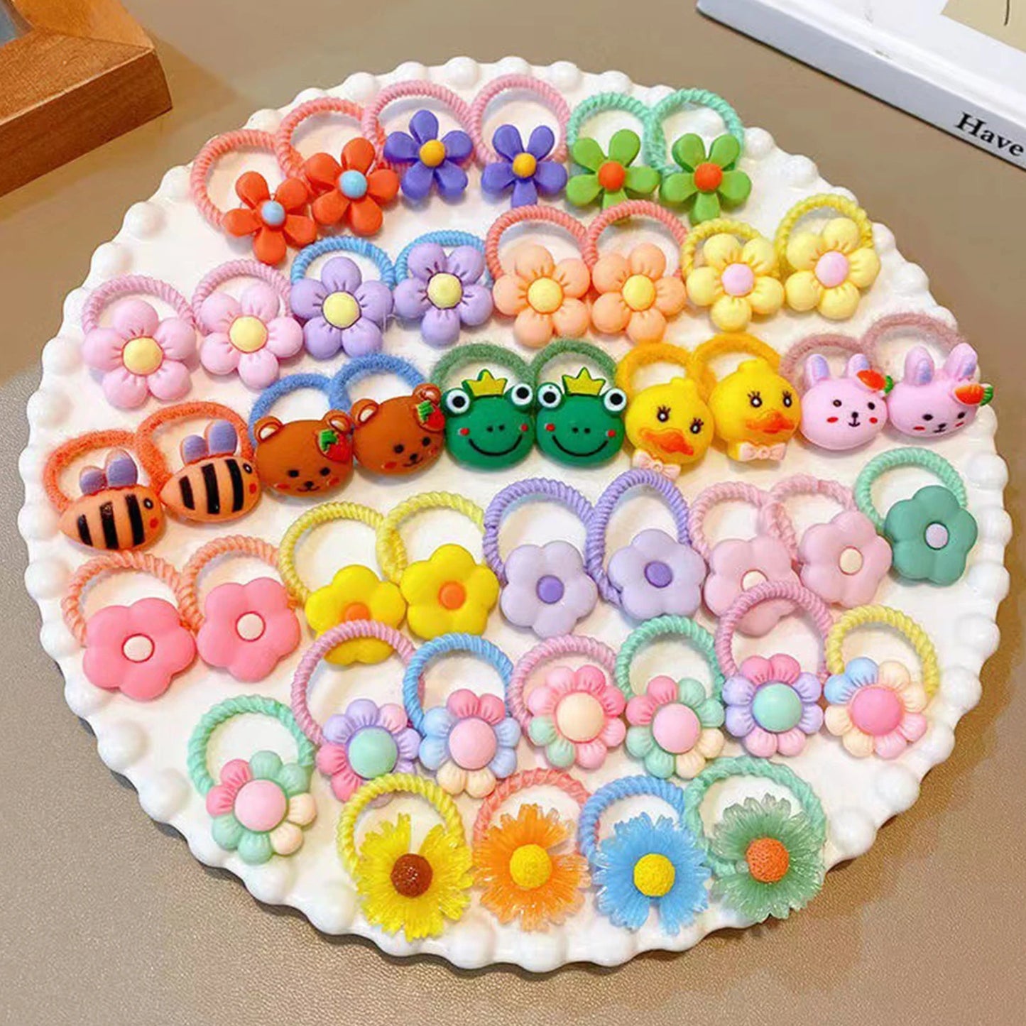 the DAISY DOG BOW - 40PCS Hair Bows, Fashion Cute Small Dog/Cat Hair Bows, Dogs/Cats Hair Accessories, Rubber Bands Bows for Dogs Grooming Products