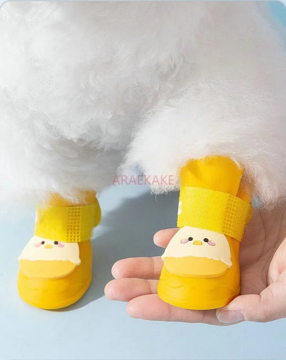 the RAIN BOOTS - Dogs Waterproof Cute Egg-Shaped Silicone Rain Shoes, Small and Medium-Sized Dogs, Rain Resistant, Anti-Slip Pet Shoes