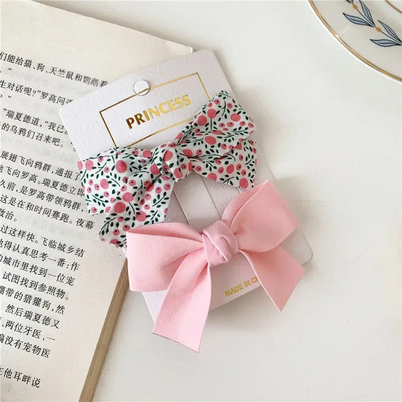 the BEAUTY BOWS - 2PCS Solid Dog Bows, Dog Hair Clips, Pet Bowknot, Doggy Hair Grooming Products for Puppy/Kitten/Dog, Hair Barrette Pet Accessories