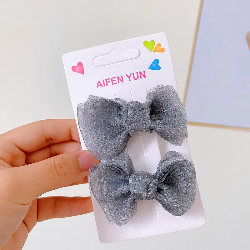 the BEAUTY BOWS - 2PCS Solid Dog Bows, Dog Hair Clips, Pet Bowknot, Doggy Hair Grooming Products for Puppy/Kitten/Dog, Hair Barrette Pet Accessories