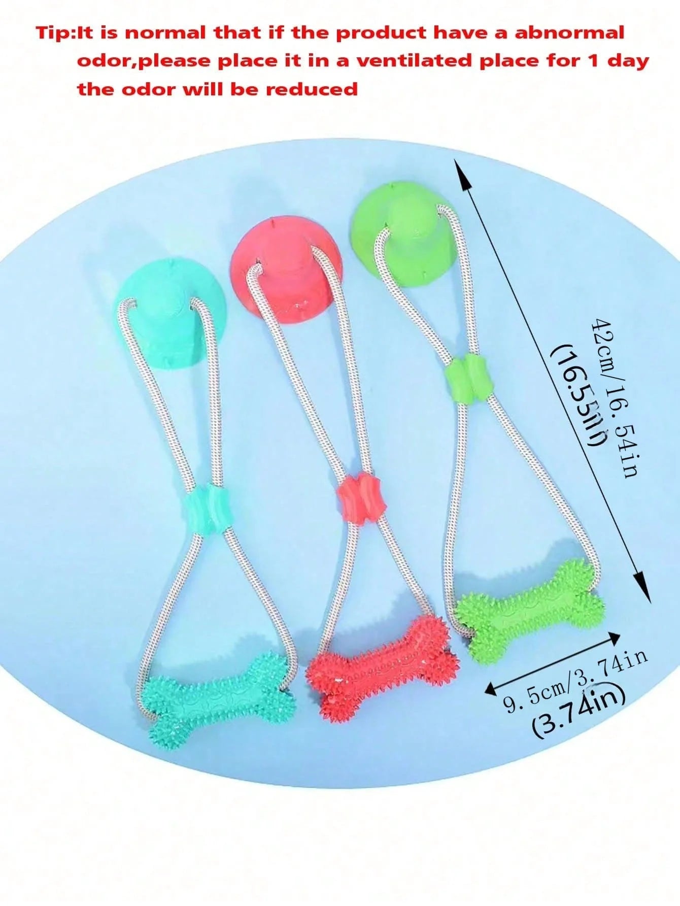 A TPR dog gnaws on a toy sucker bottom bone and grinds its teeth with a bite-resistant training stick